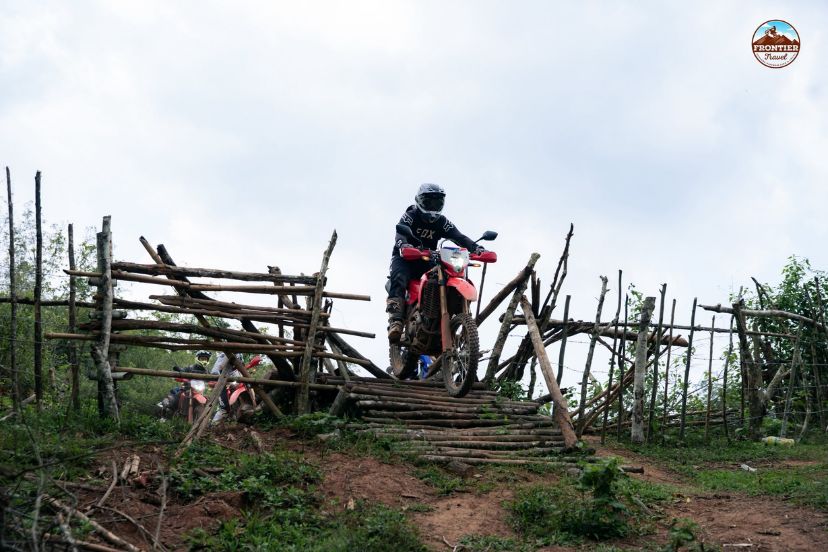 Follow a structured rail-to-peak route across Ha Giang&rsquo;s rugged frontier